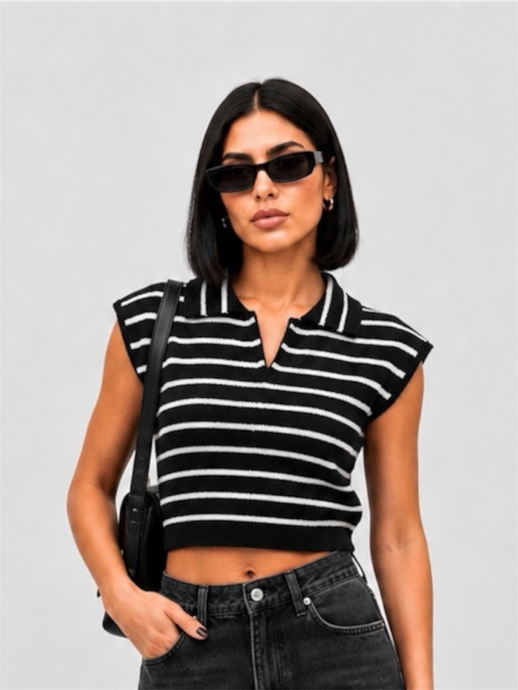 POLO A RAYURES SANS MANCHES EN MAILLE NOIR